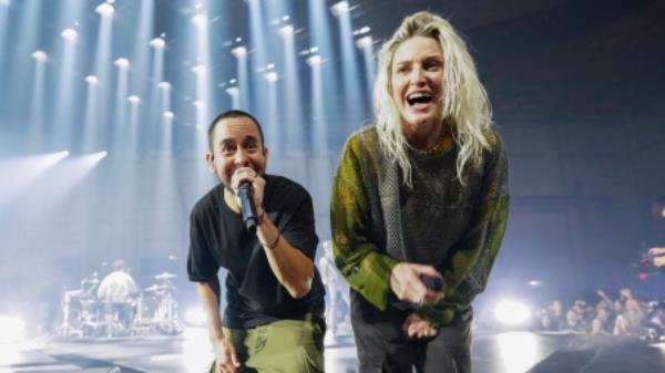 Mike Shinoda and new co-lead vocalist Emily Armstrong perform during the band’s livestream on 5 Sept. Photo: AP
