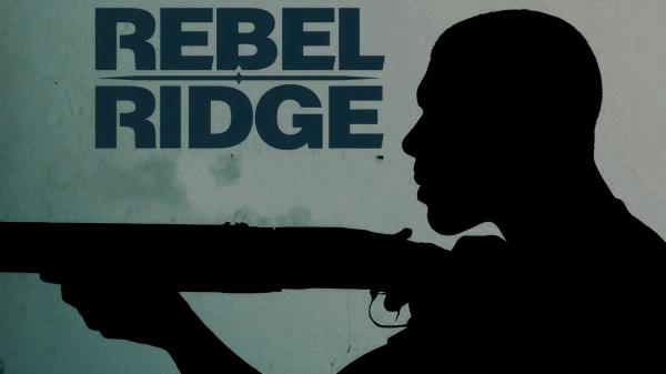 Aaron Pierre with a shotgun in silhouette in the Netflix movie Rebel Ridge