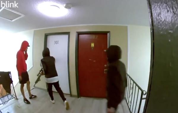 Surveillance video of alleged armed TdA gangbangers taking over an apartment building in Aurora, Colorado.