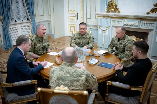 This handout photograph taken and released by the Ukrainian Presidential Press Service on November 21, 2024 shows Ukrainian President Volodymyr Zelensky (R), Commander-in-Chief of the Armed Forces of Ukraine Oleksandr Syrsky (2nd, R) during their meeting with the Chief of the Defence Staff of the United Kingdom Admiral Tony Radakin (top L) in Kyiv, amid the Russian invasion of Ukraine. — AFP pic